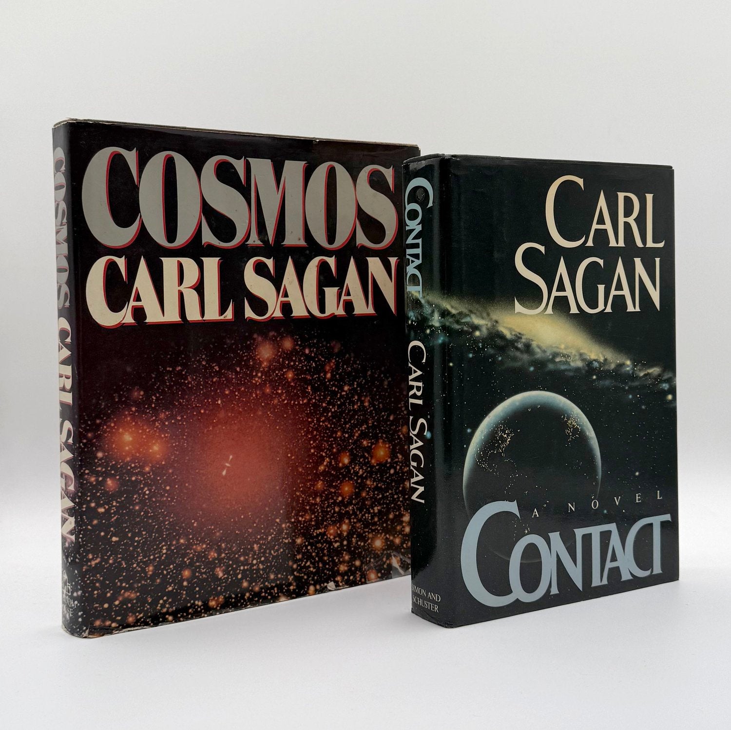 Cosmos and Contact by Carl Sagan 1980 first edition - illustrated science books Random House space astronomy