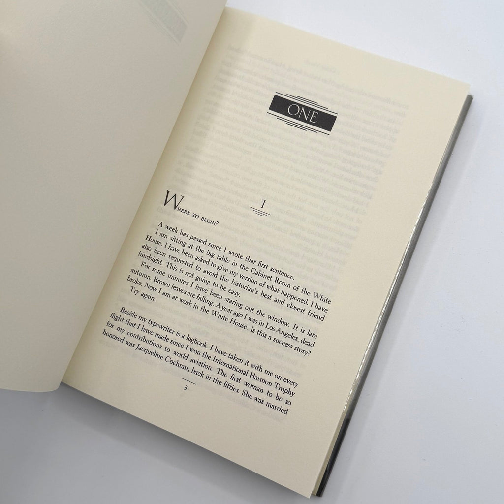 Open book with text on a white background