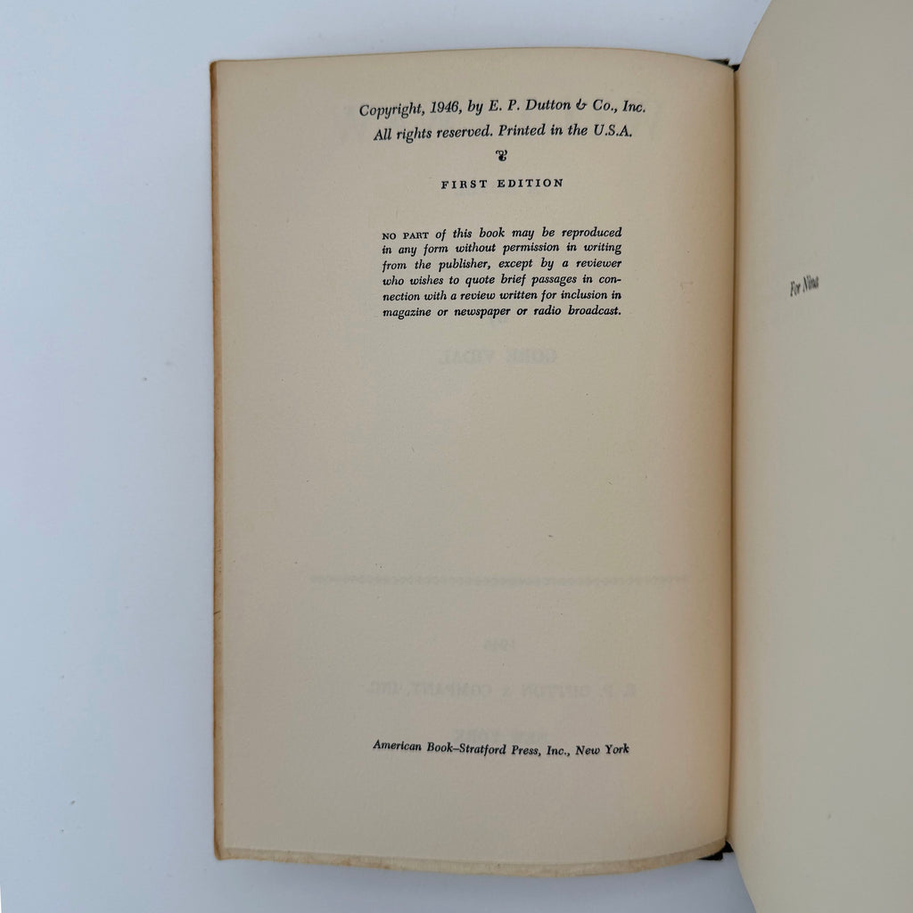 Open book showing copyright page with text on a white background
