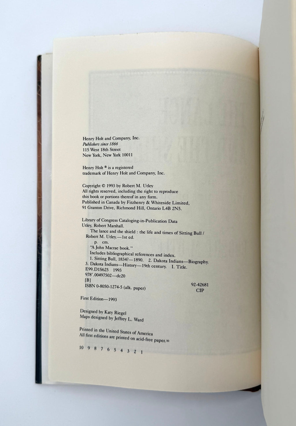 Open book showing copyright page on a white background