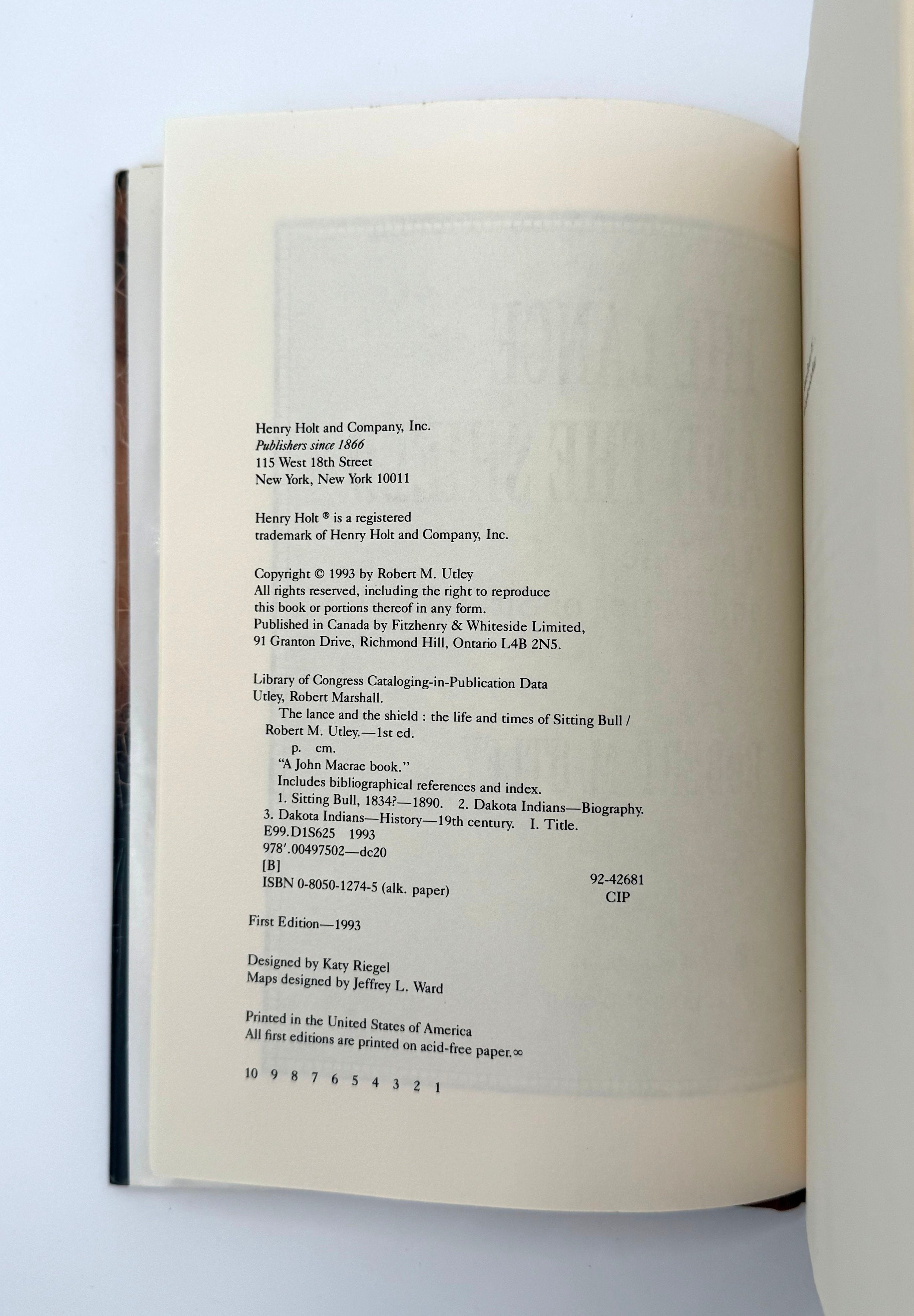 Open book showing copyright page on a white background
