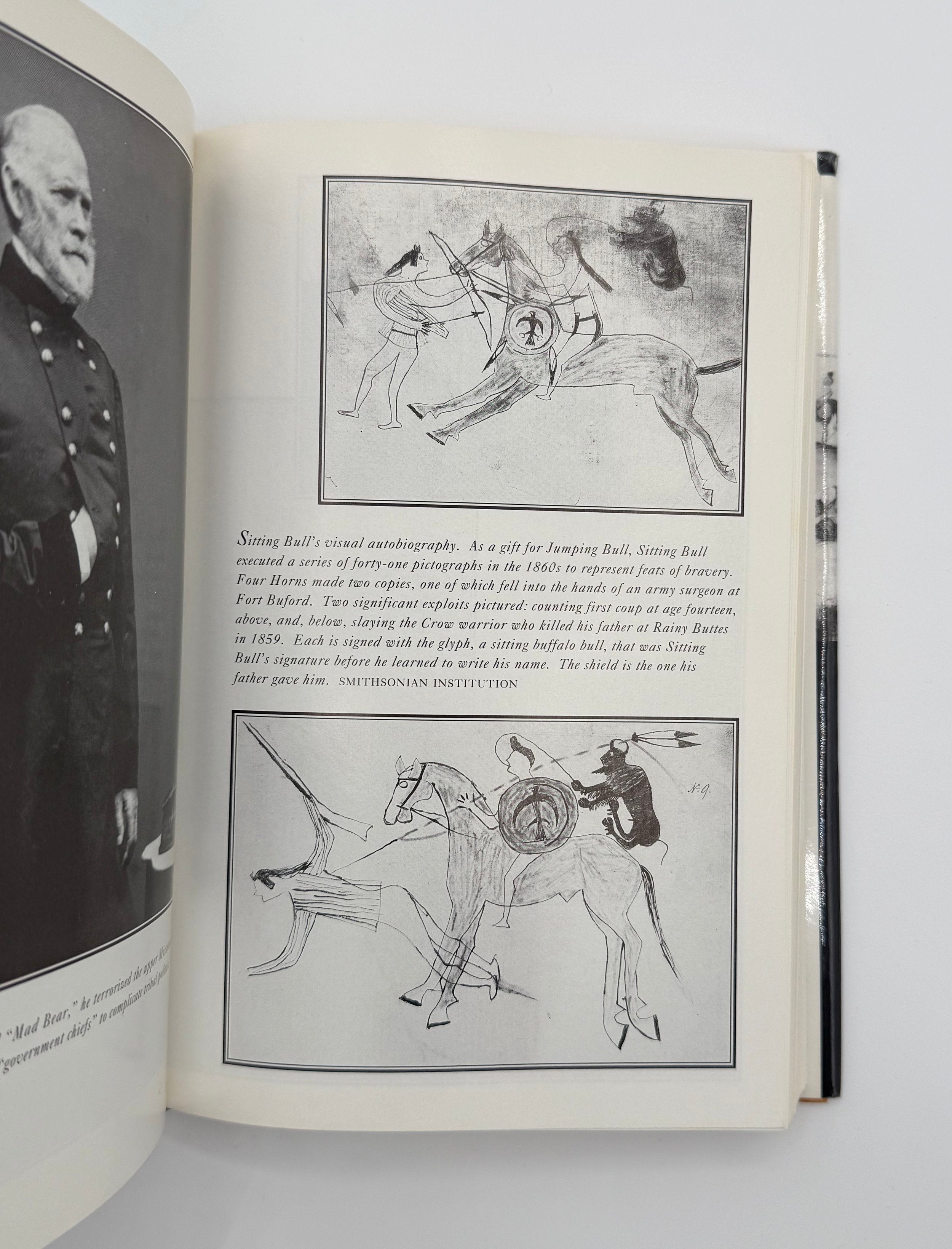 Open book with illustrations and text on a white background