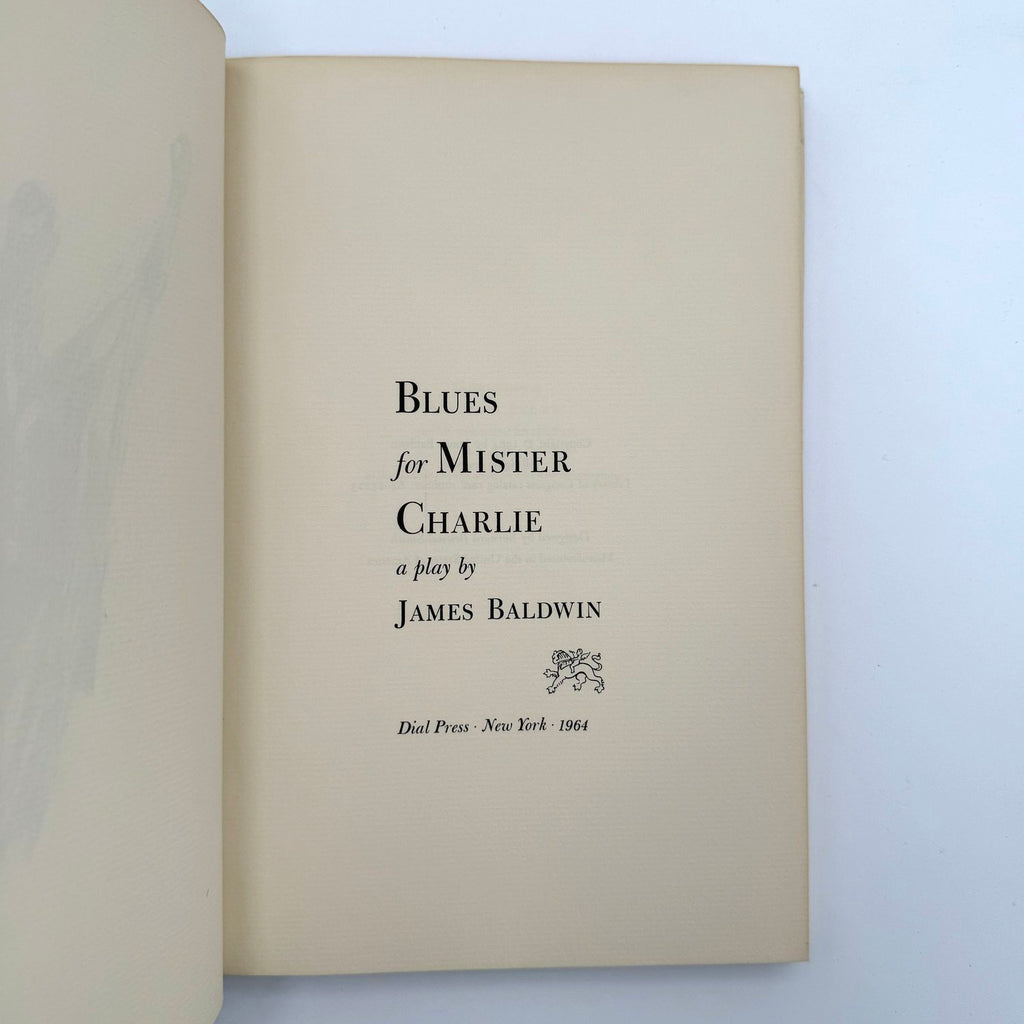Book titled 'Blues for Mister Charlie' by James Baldwin on a light background