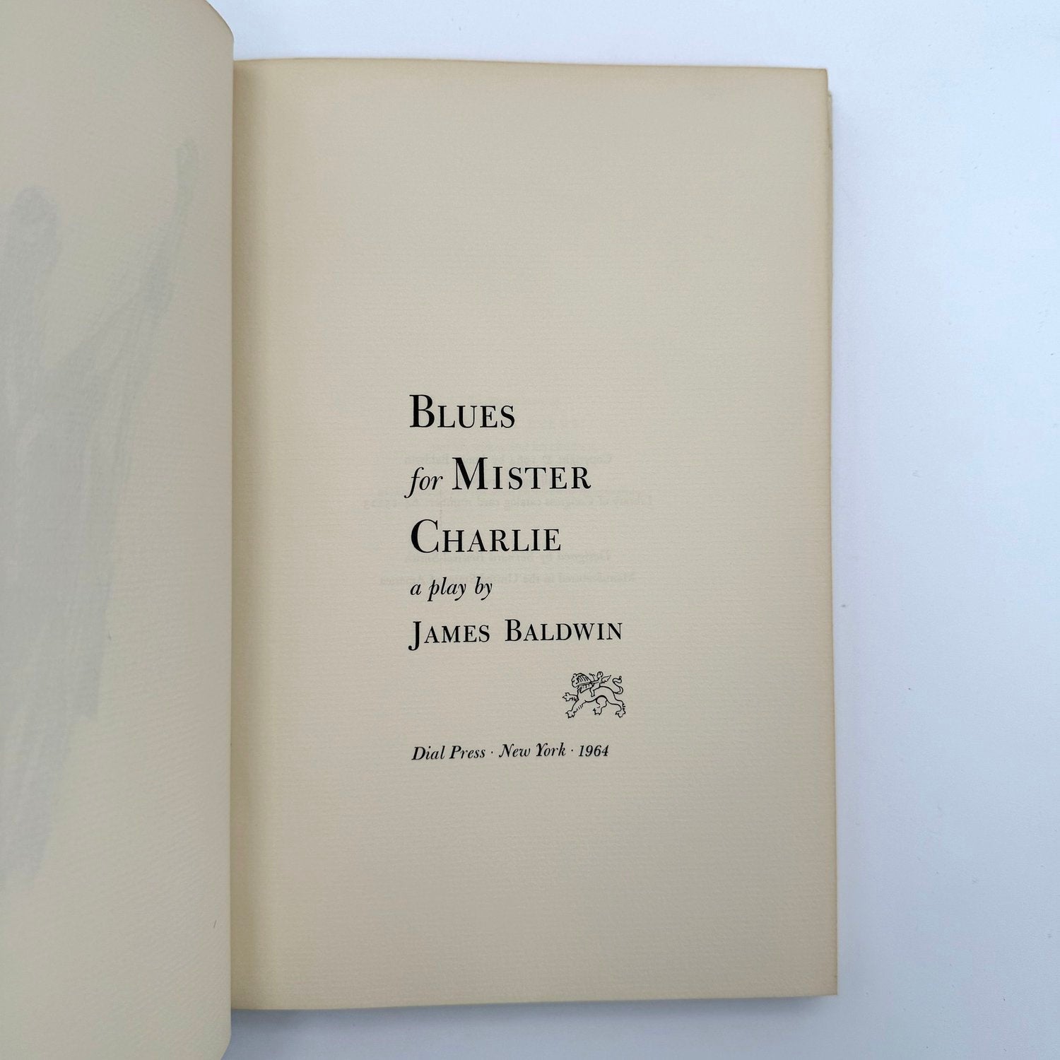 Book titled 'Blues for Mister Charlie' by James Baldwin on a light background