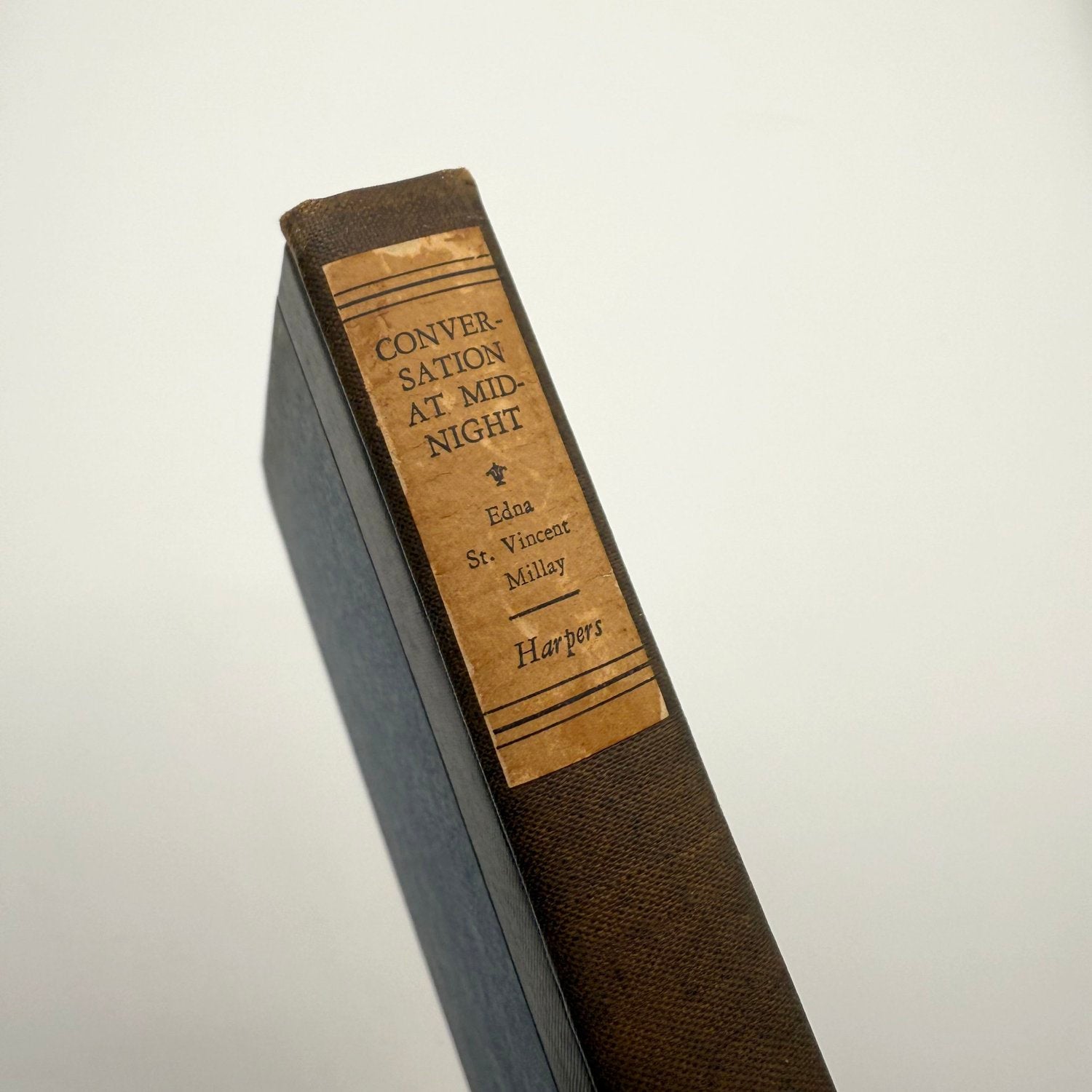 Book spine titled Conversations at Midnight