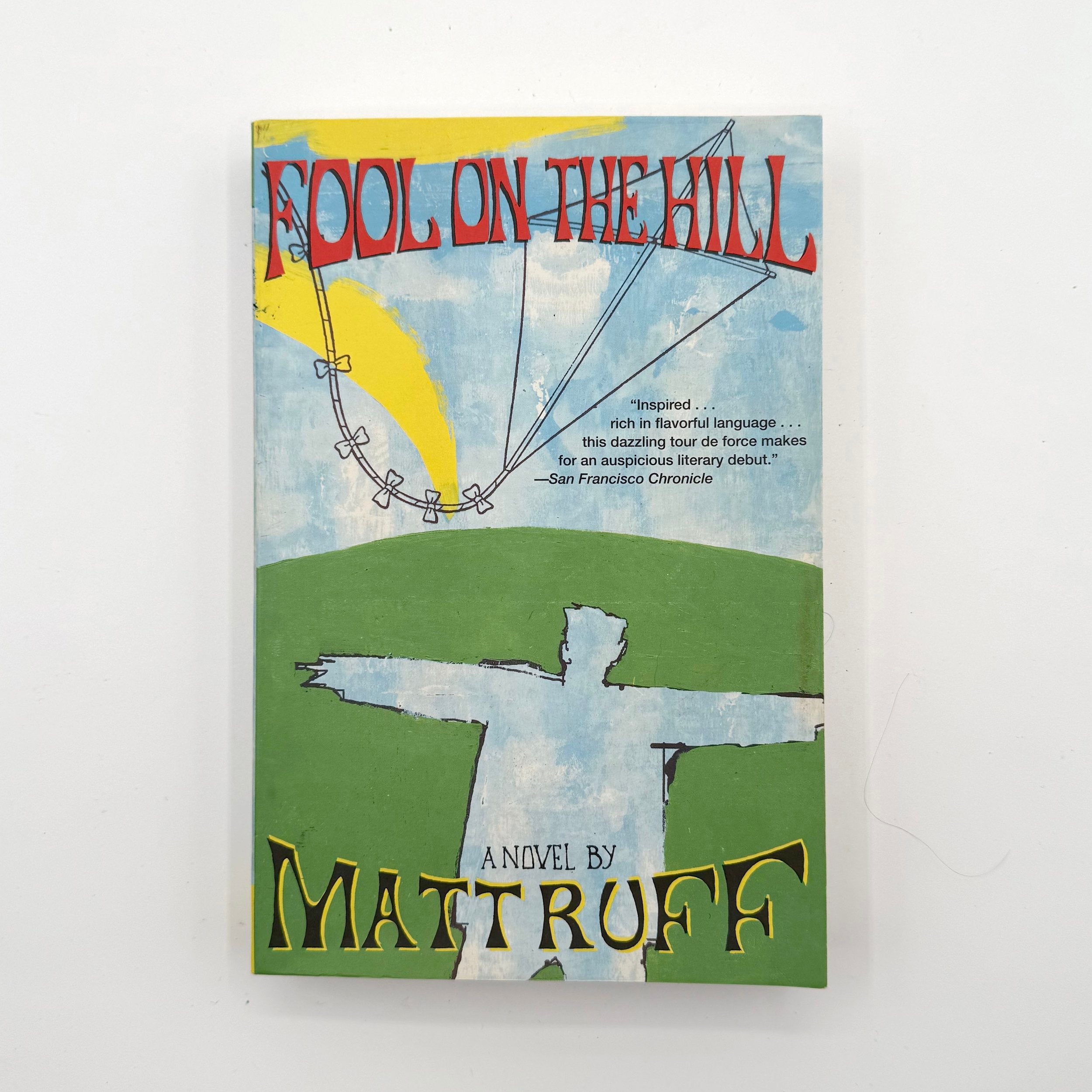 Book cover of 'Fool on the Hill' by Matt Ruff with a colorful design and text.