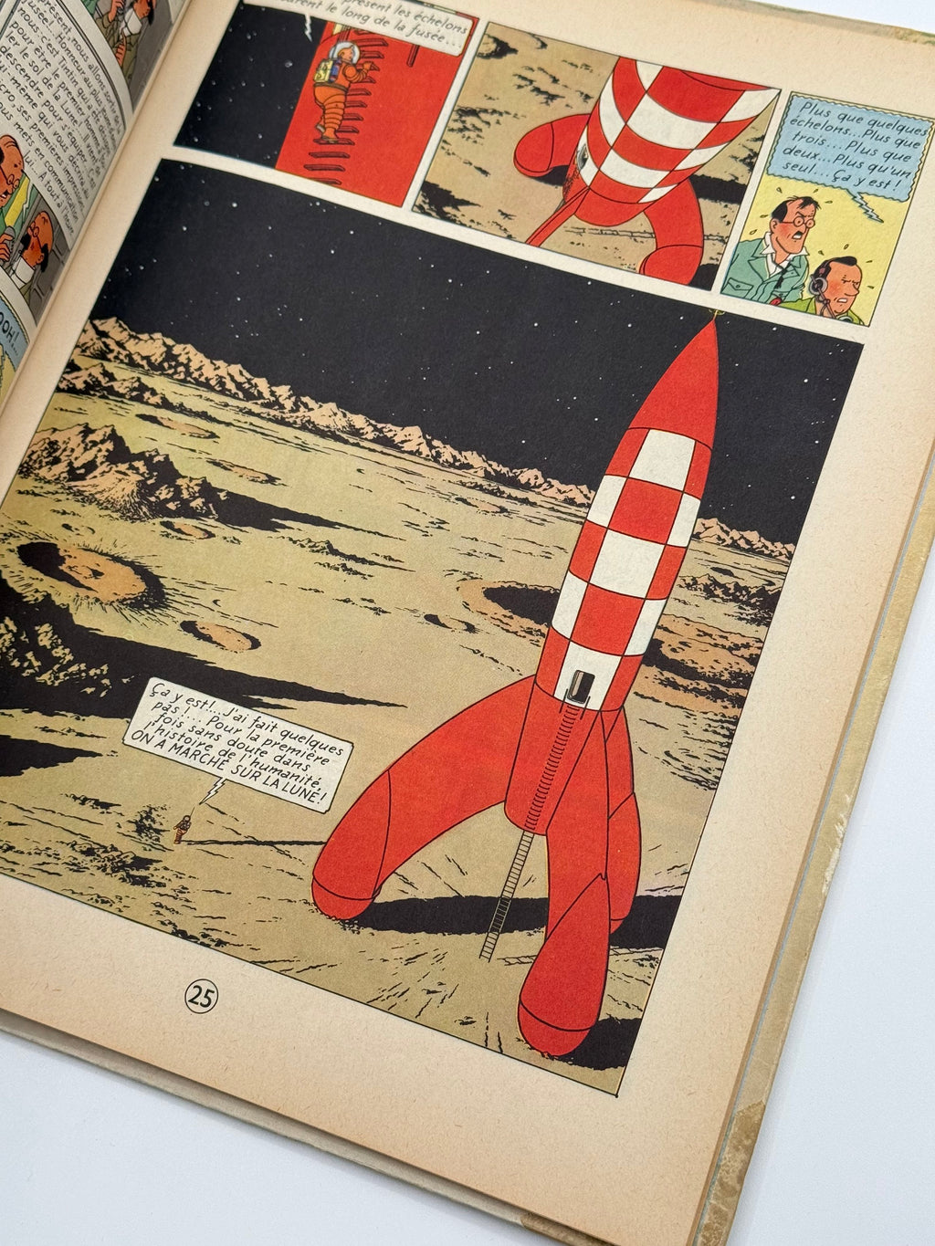 Comic book page with a red rocket ship on a moon landing scene