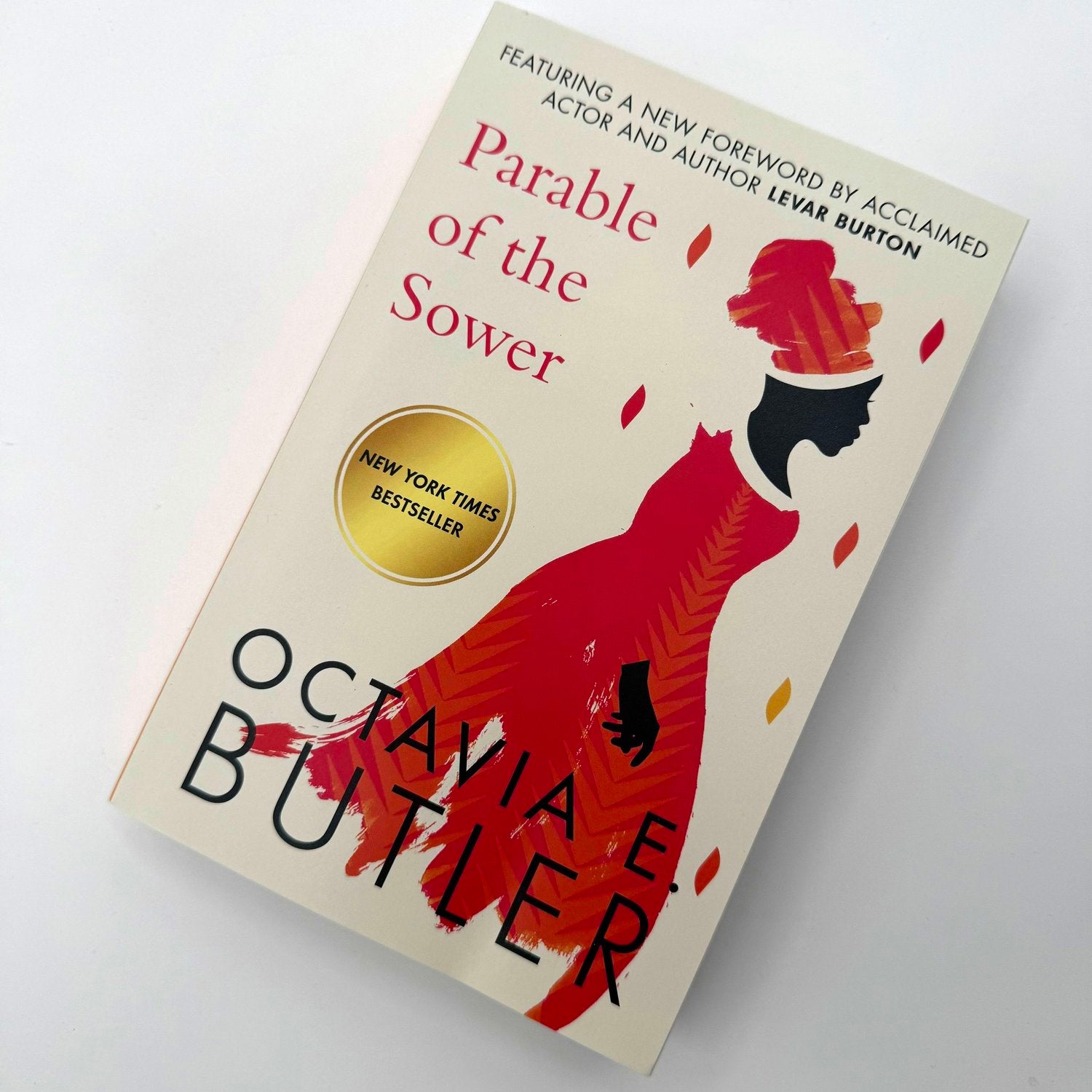 Parable of the Sower by Octavia E Butler paperback book cover - dystopian science fiction climate novel