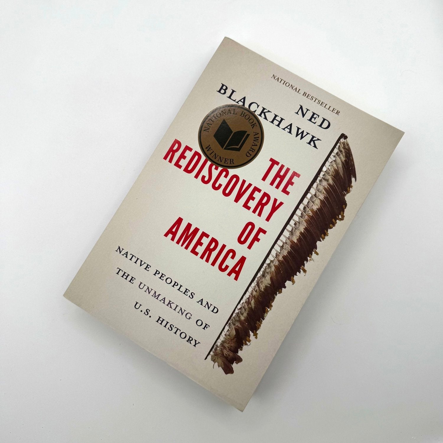 The Rediscovery of America by Ned Blackhawk paperback book cover - Pulitzer Prize winning Native American history