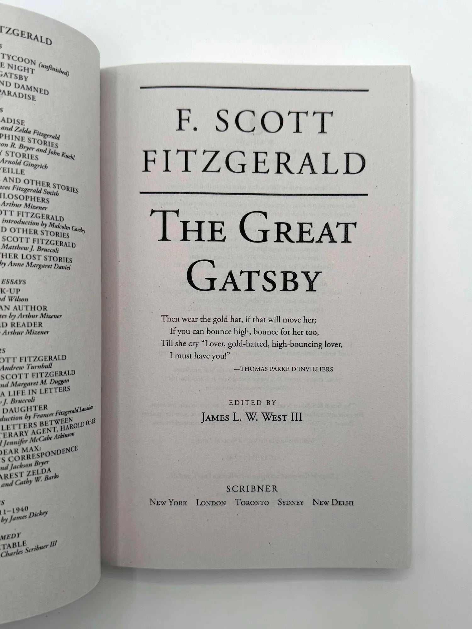 Open book showing the title page of 'The Great Gatsby' by F. Scott Fitzgerald.