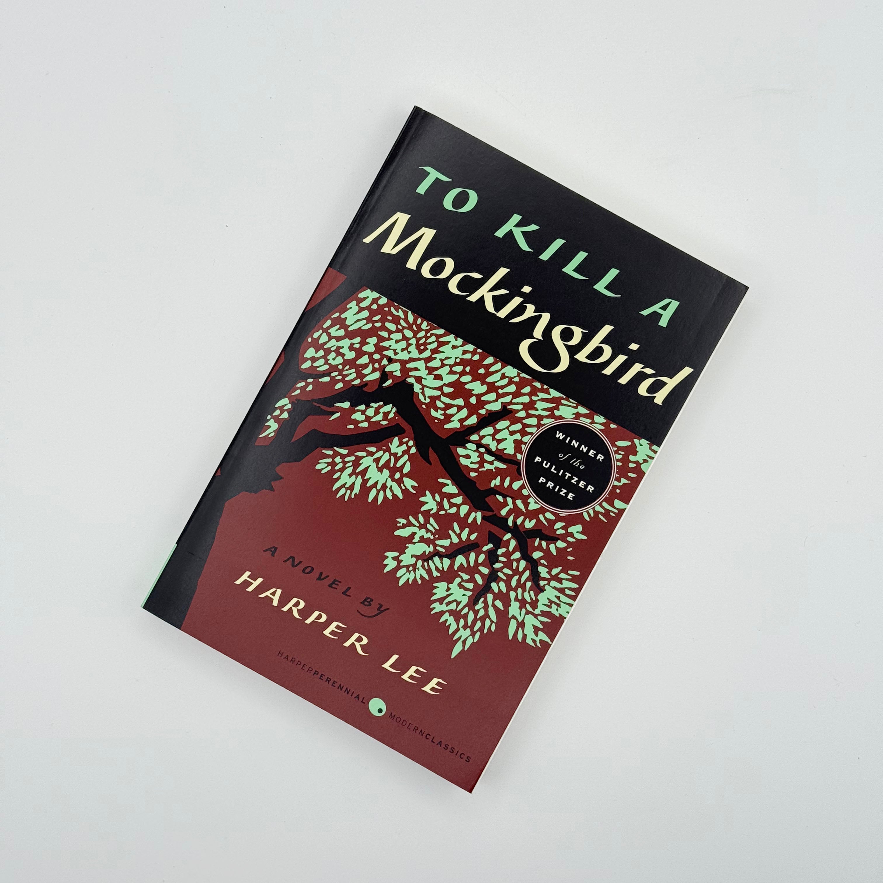 To Kill a Mockingbird by Harper Lee paperback book cover - Harper Perennial Pulitzer Prize winning classic