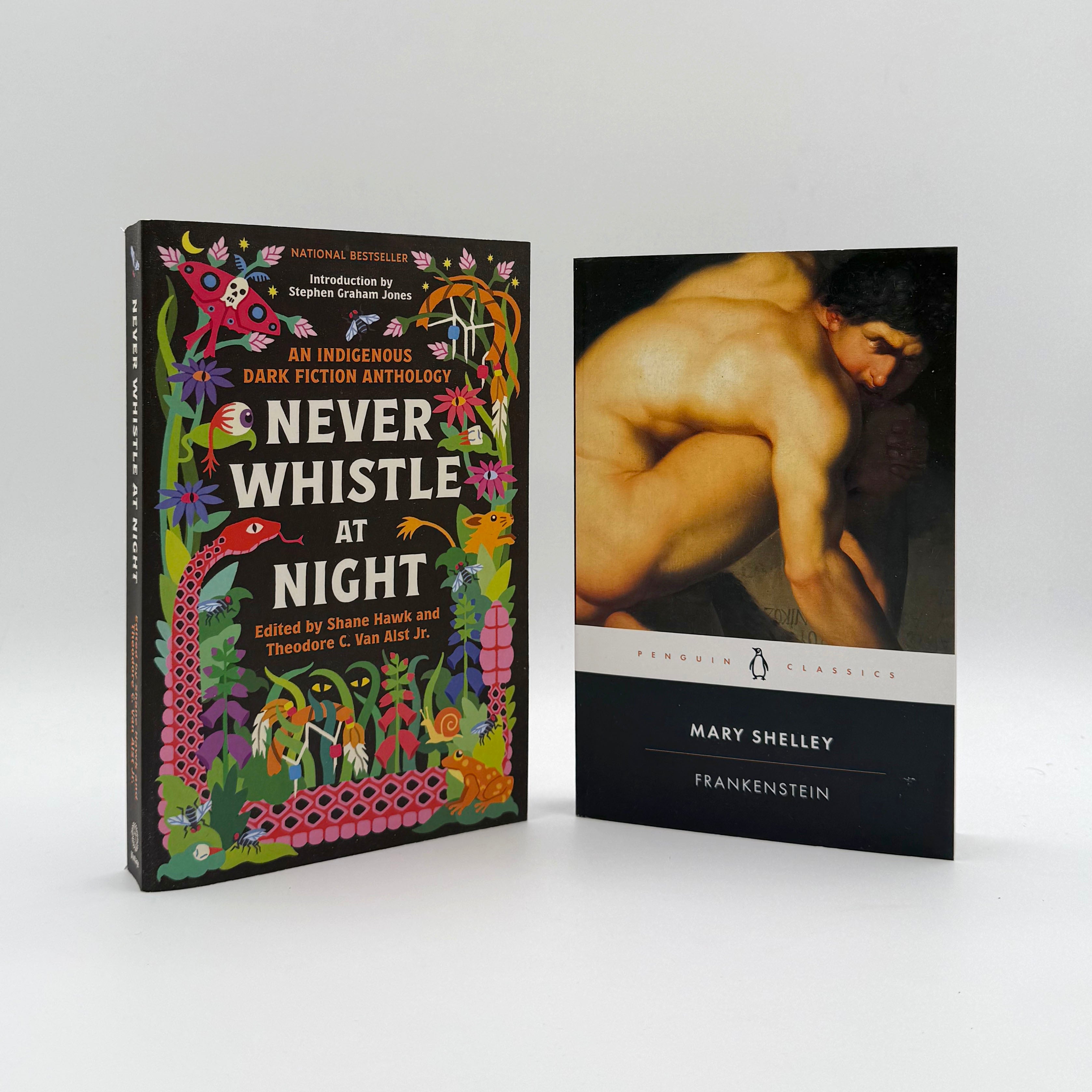 Two books titled 'Never Whistle at Night' and 'Frankenstein' on a white background