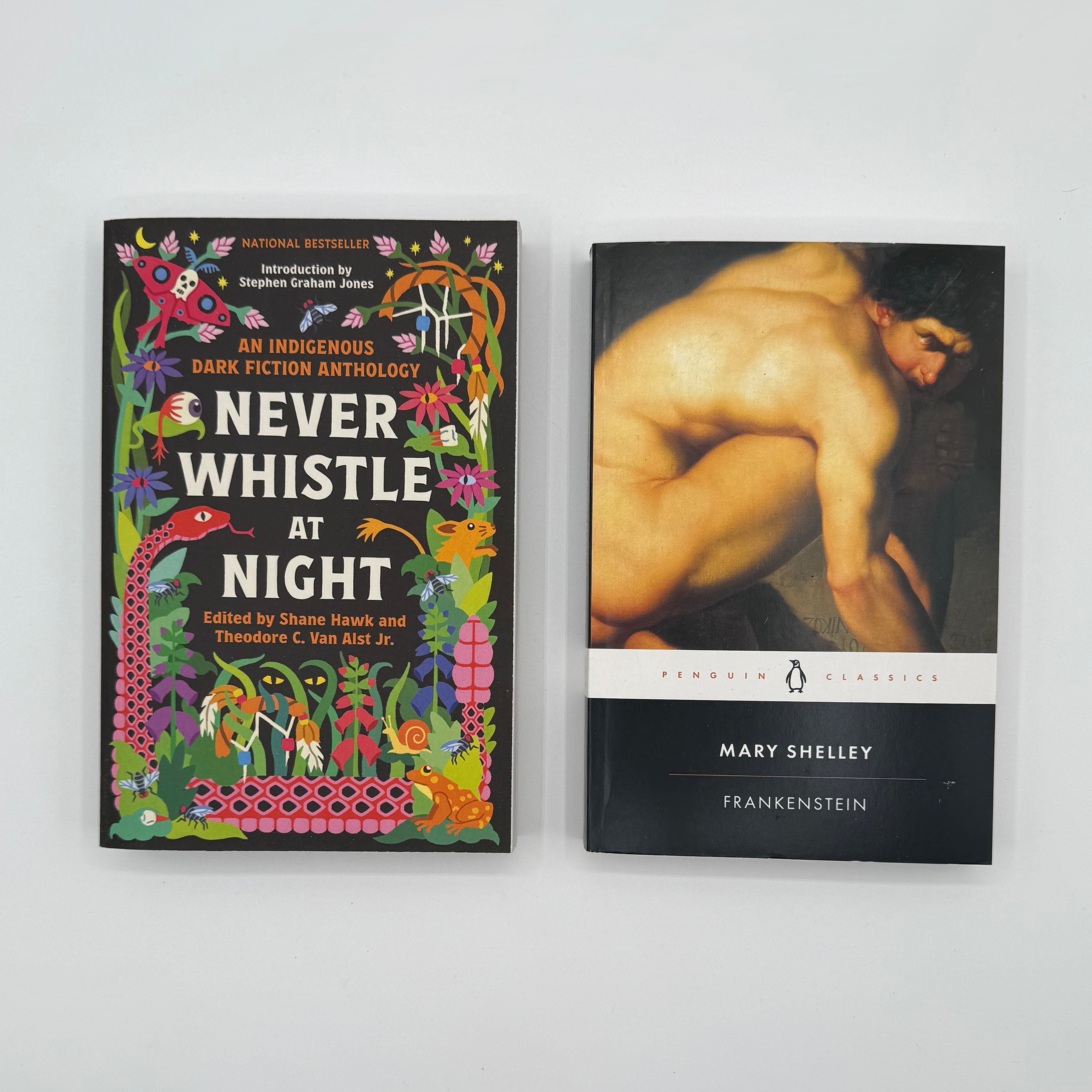 Two books titled 'Never Whistle at Night' and 'Frankenstein' on a white background