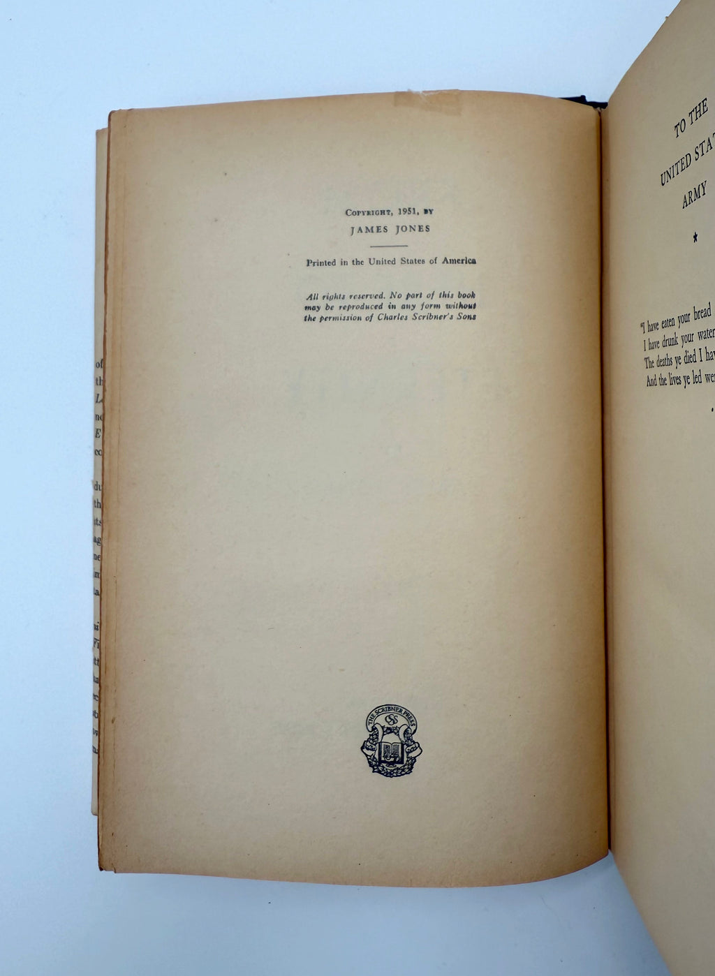 Open book with text and a logo on a light blue background