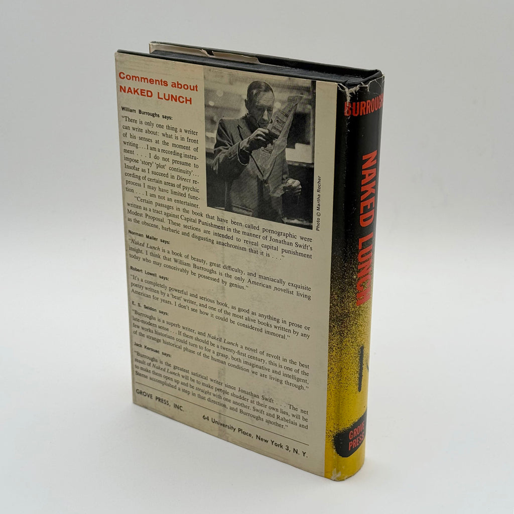 Book titled 'Naked Lunch' with a black and white photo on the back