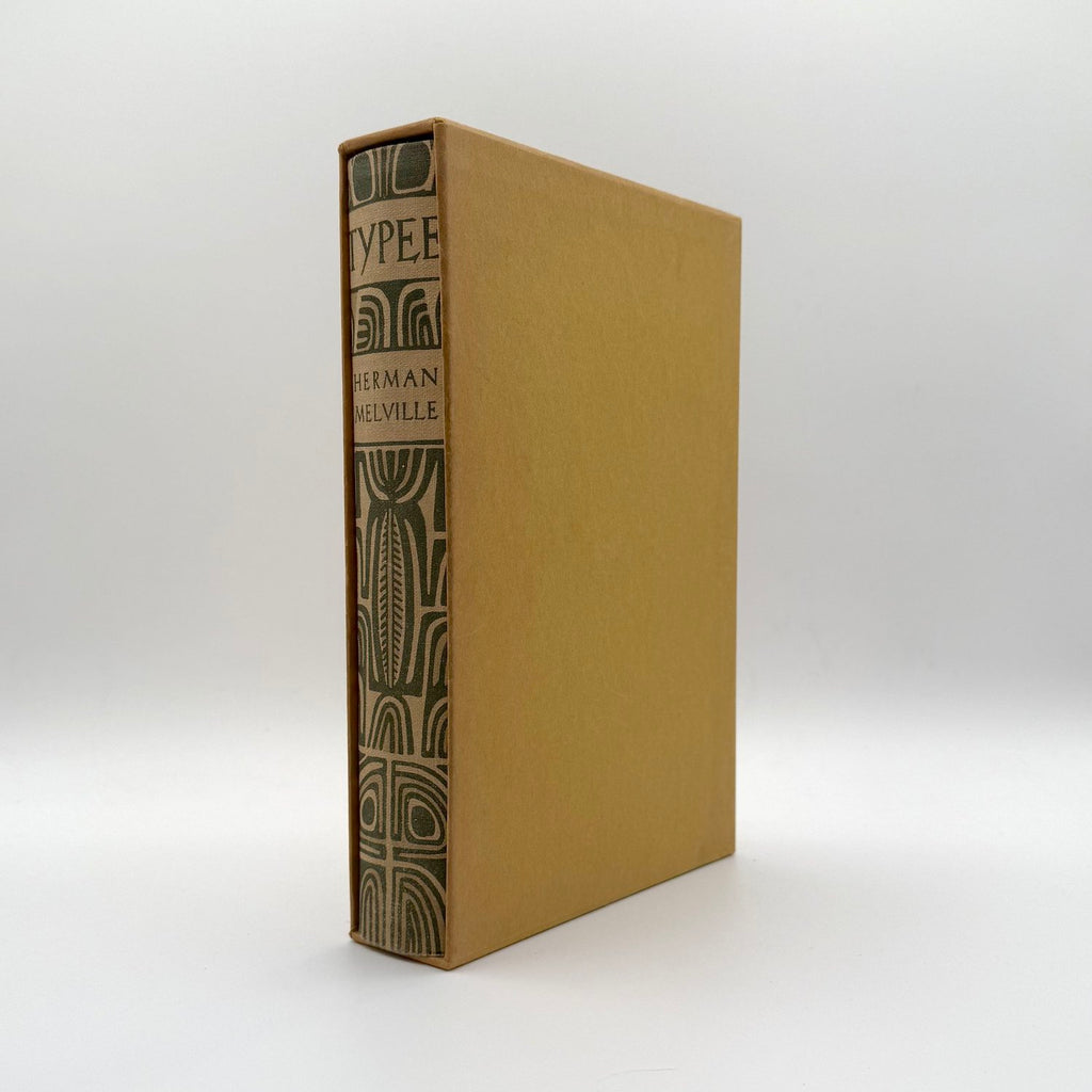 Brown slipcase with book with embossed design on spine on a white background