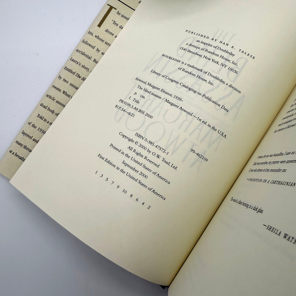 Open book with text and copyright
 on a white background