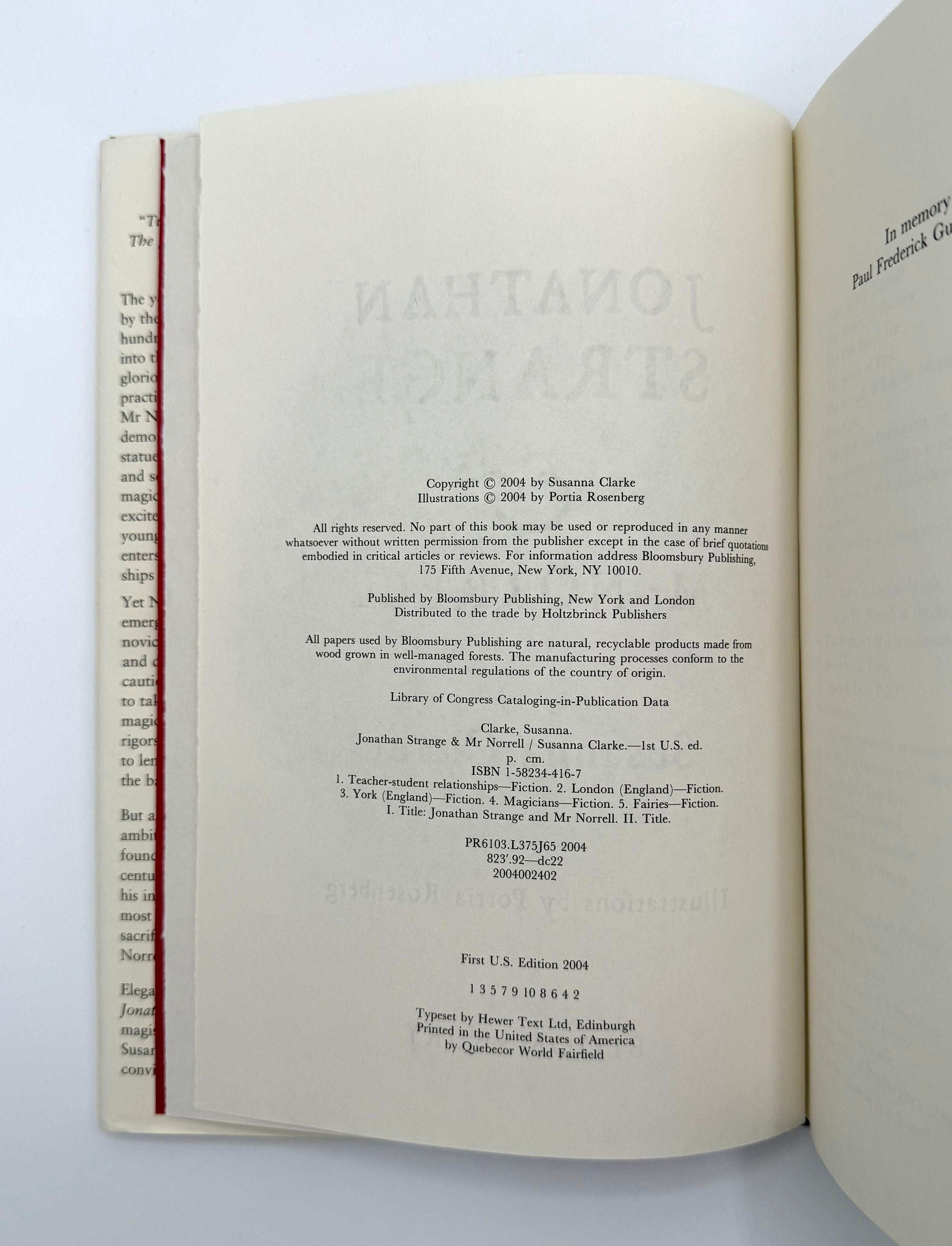 Open book showing a copyright page on a white background