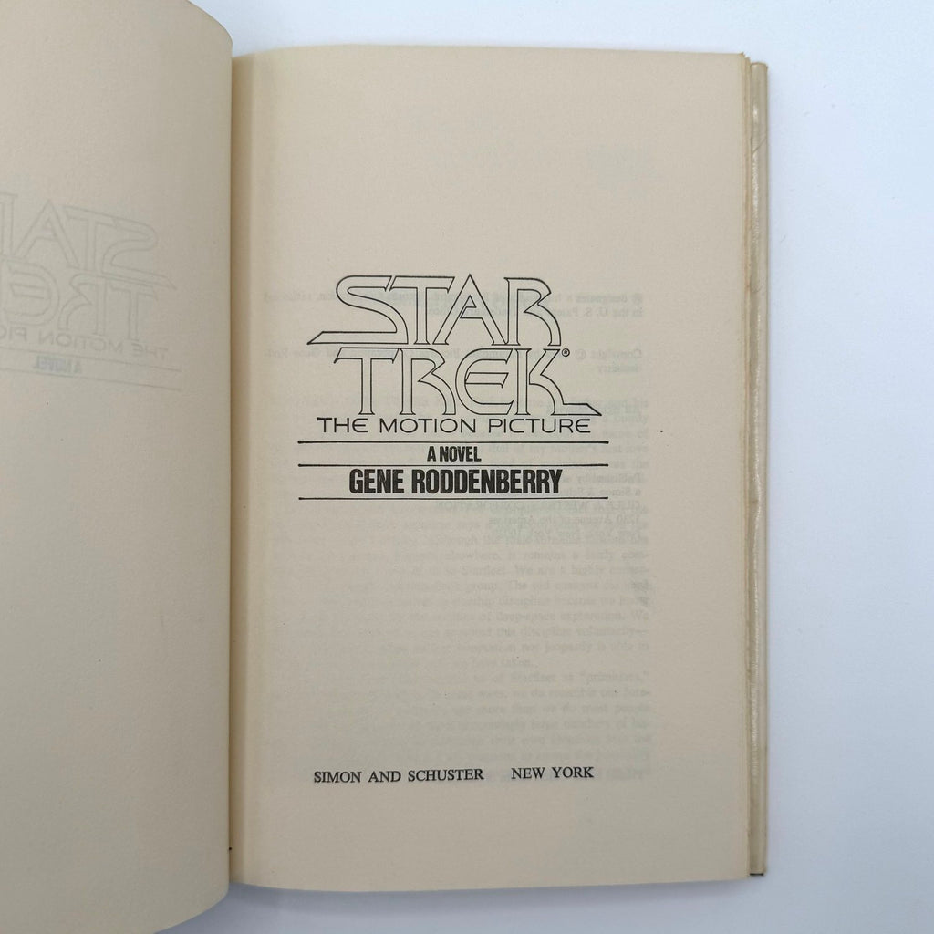 Open book with 'Star Trek: The Motion Picture' title page on a white background