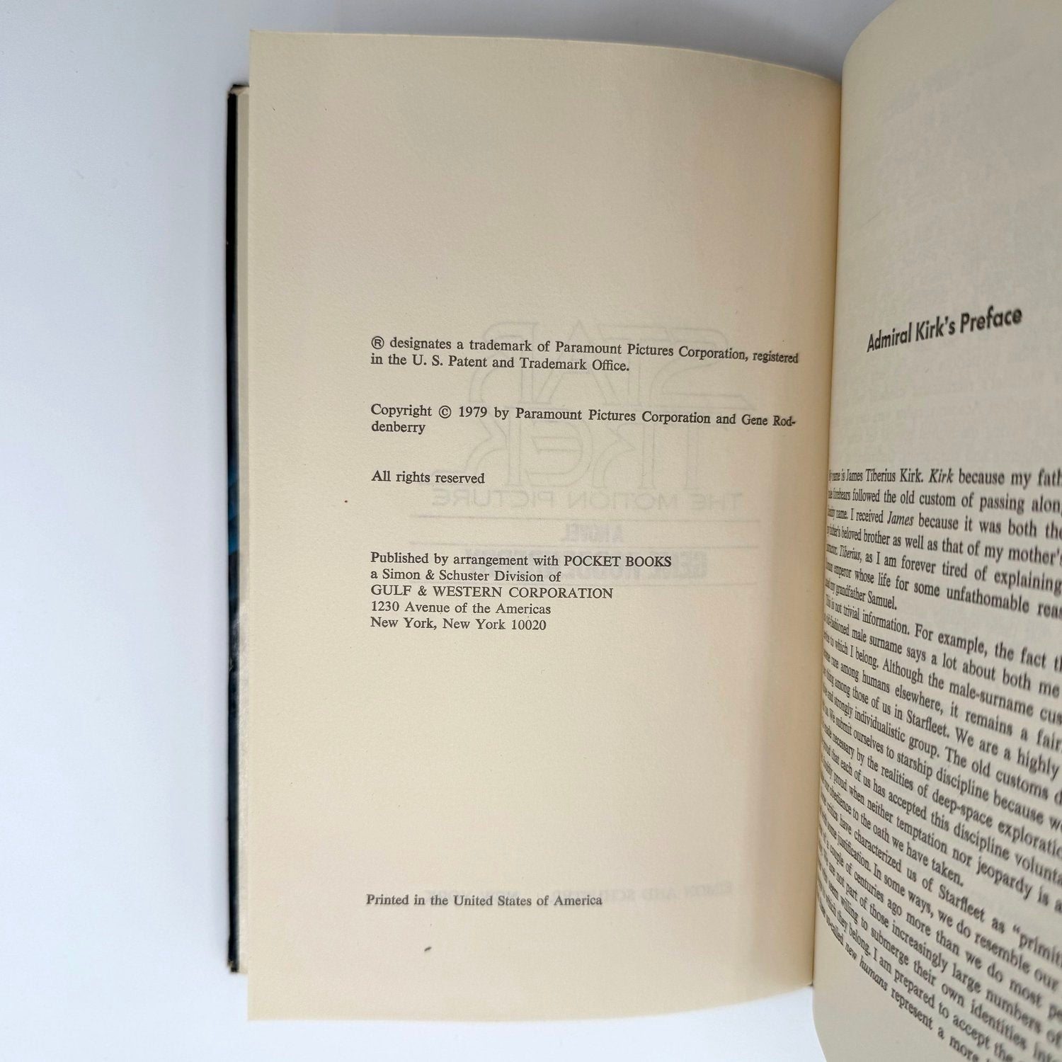 Open book with text on a white background