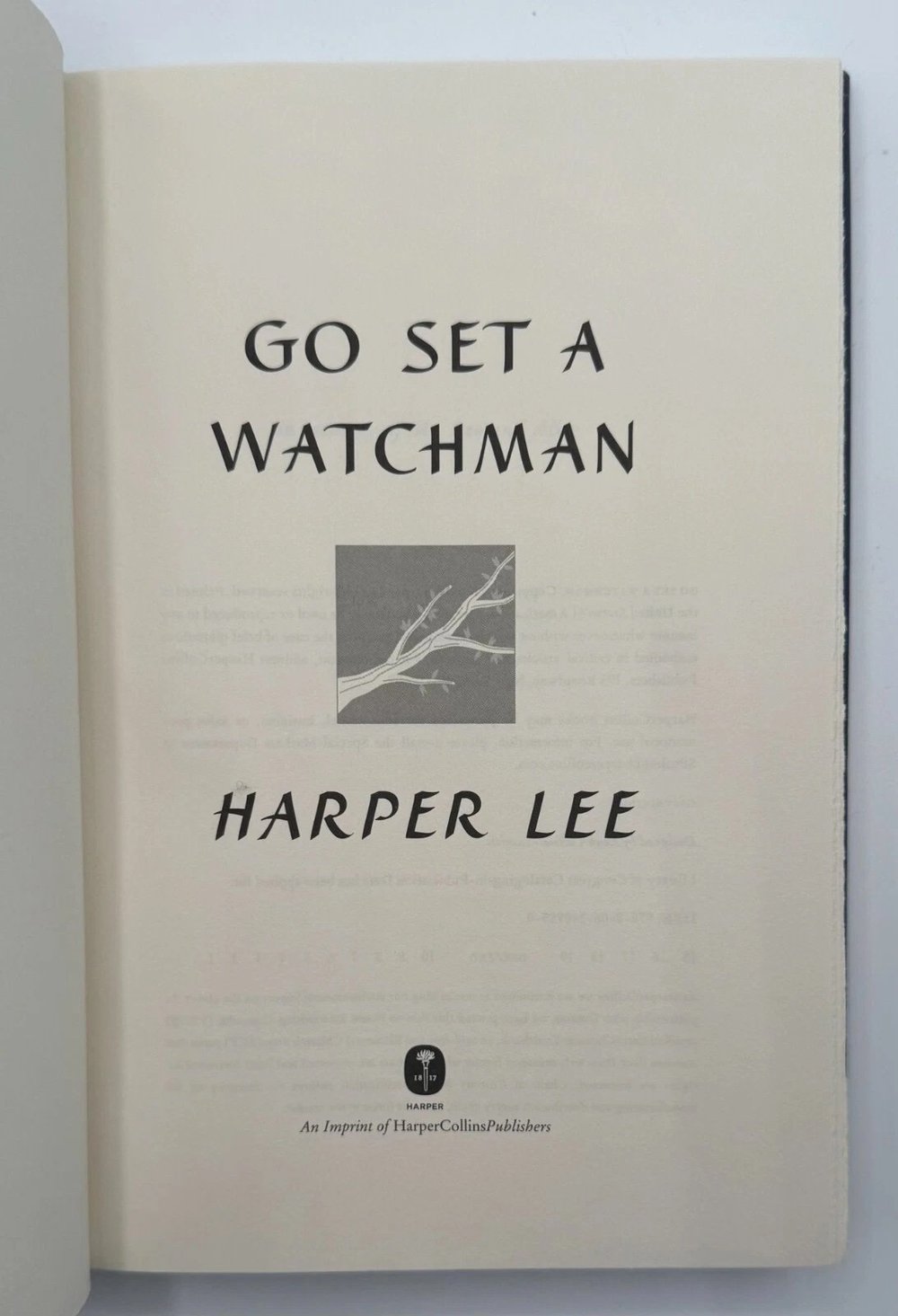 Book cover of 'Go Set a Watchman' by Harper Lee with a tree illustration.