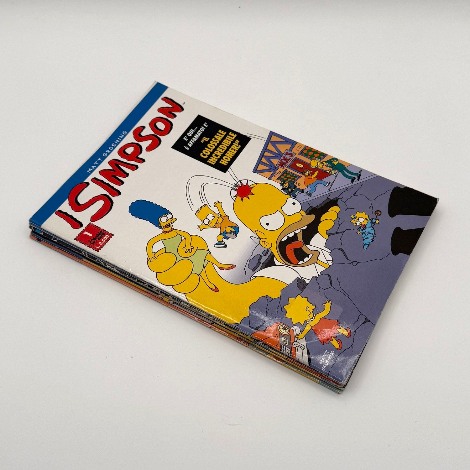 Book cover of 'I
 Simpson' with colorful graphics on a white background