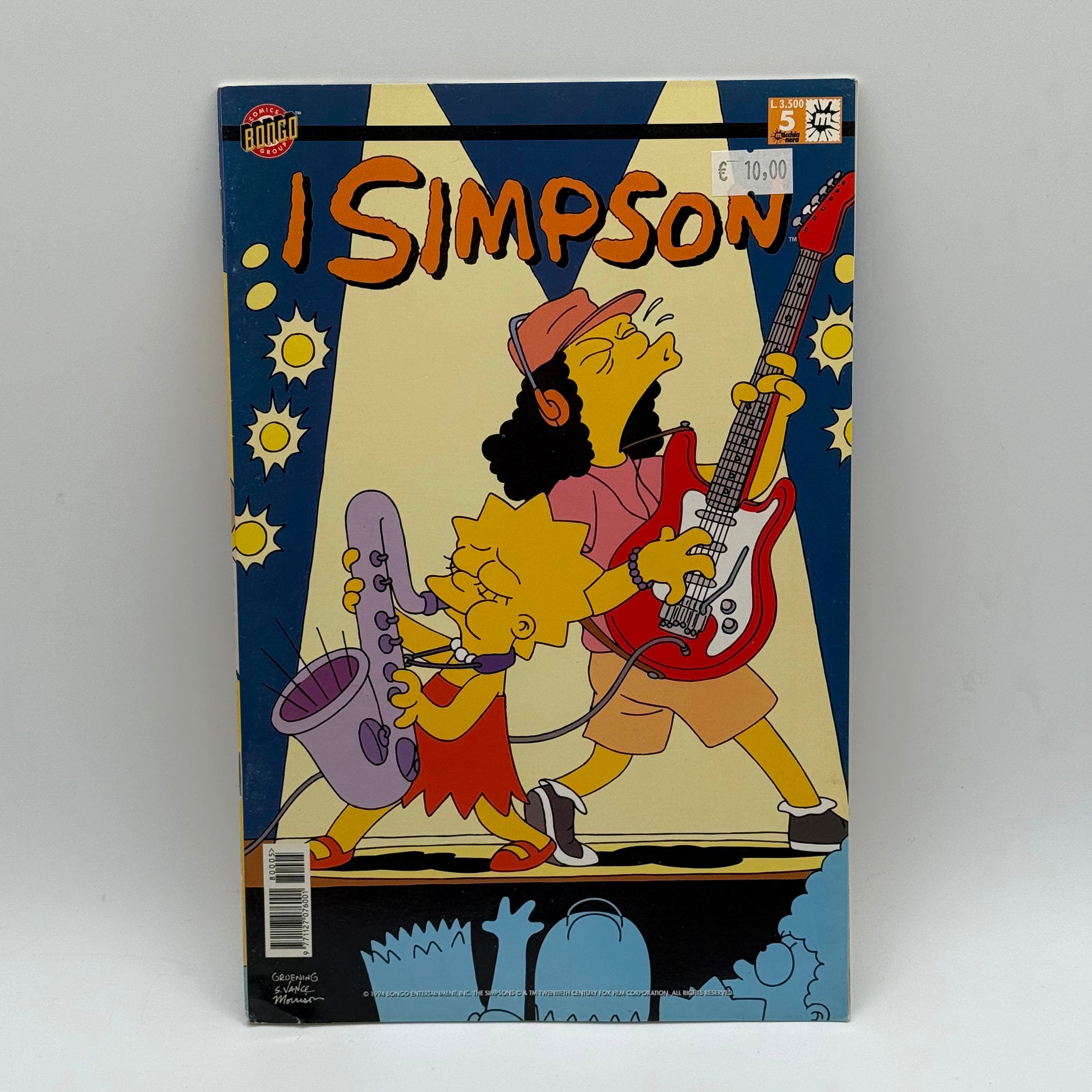 Comic book cover featuring two characters playing instruments with a blue border.