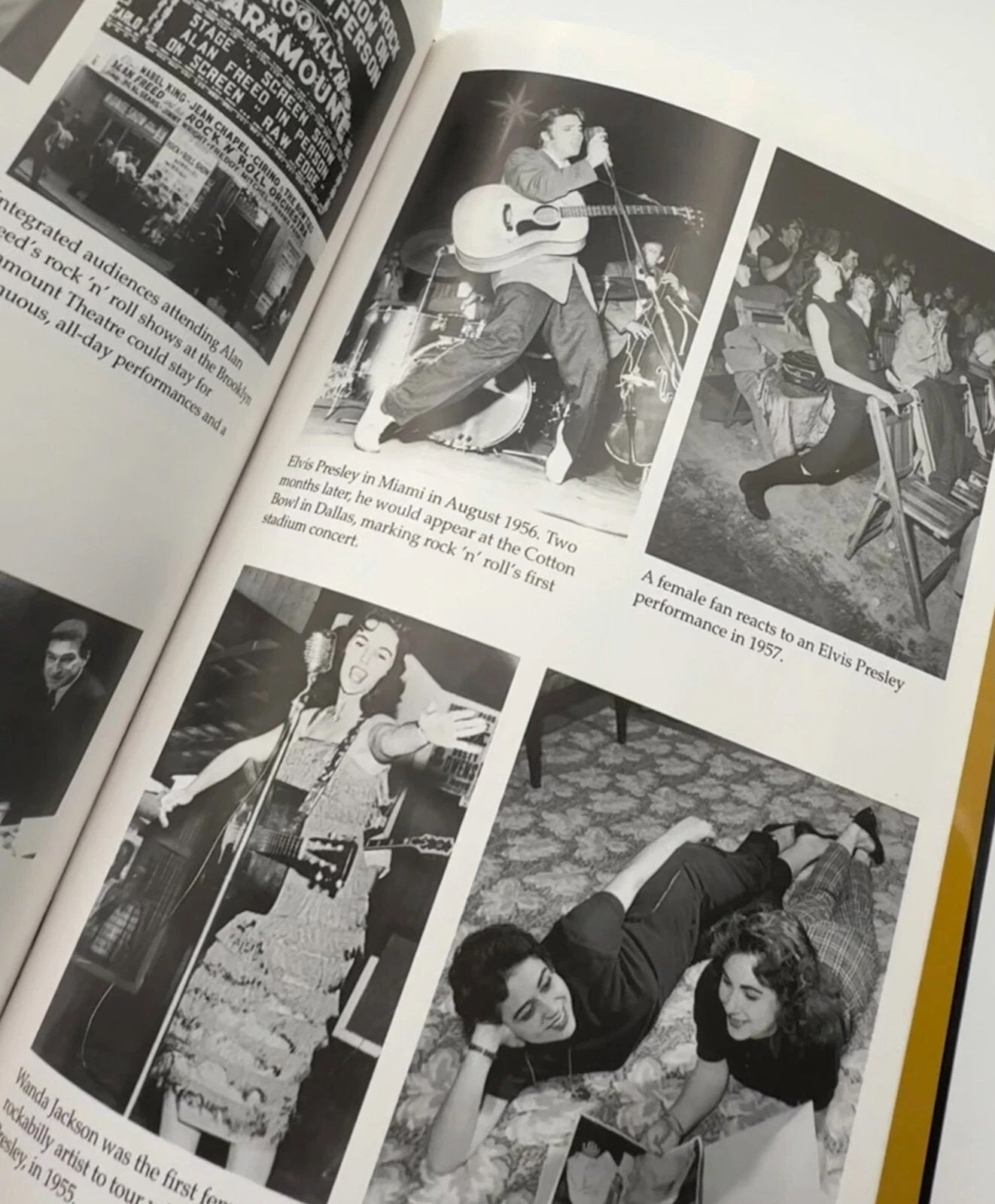 Open book with black and white photos and text about a musician and fans.
