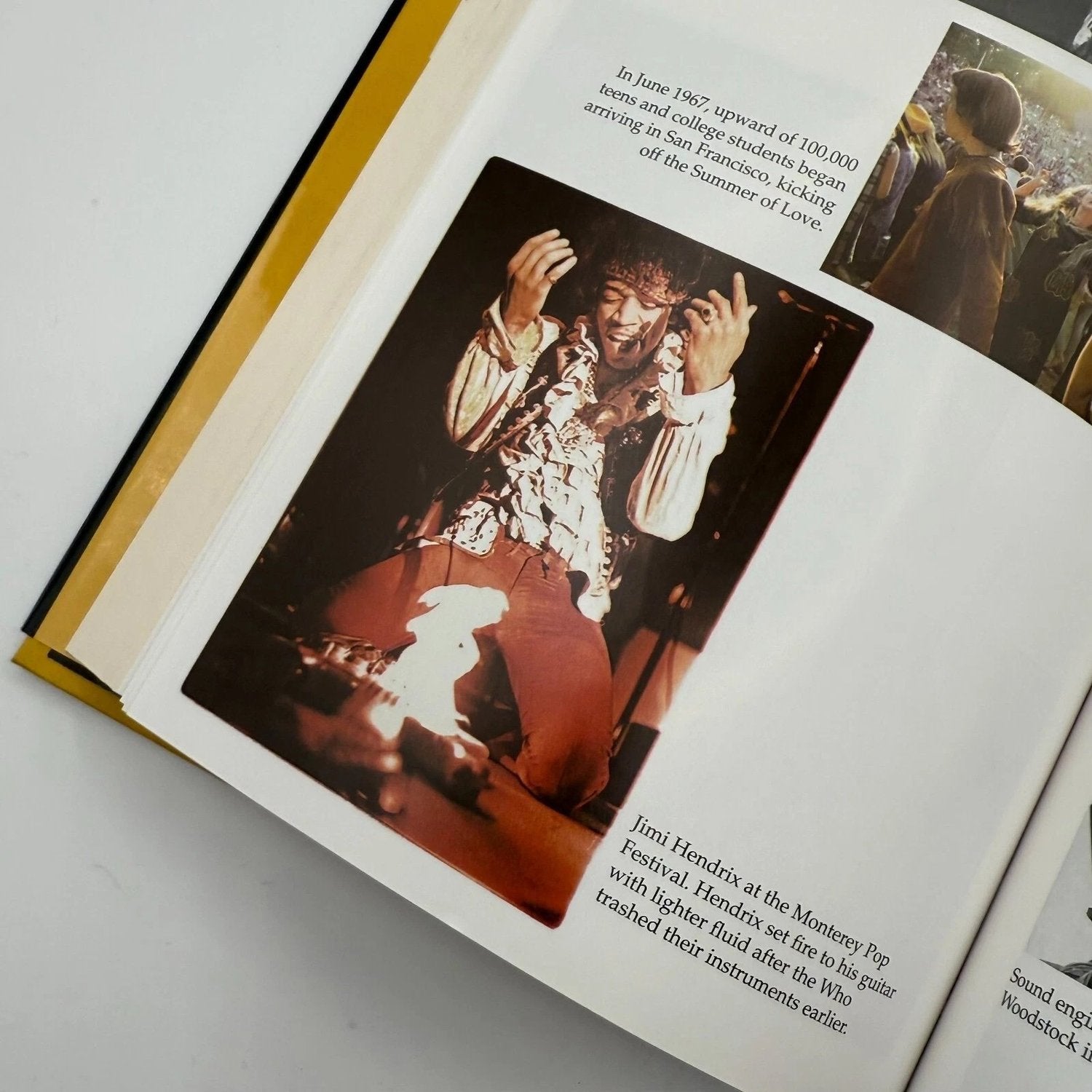 Open book with a photo of a musician 