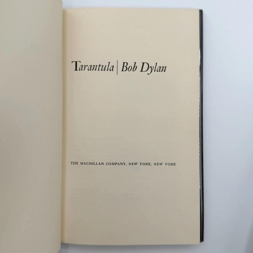 Book titled 'Tarantula | Bob Dylan' by The Macmillan Company on a white background