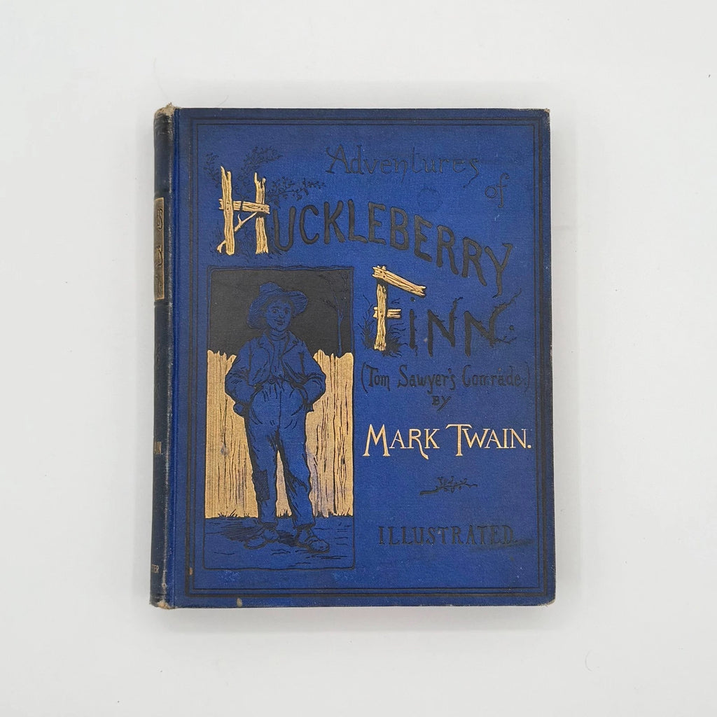Blue book cover of 'The Adventures of Huckleberry Finn' by Mark Twain on a white background