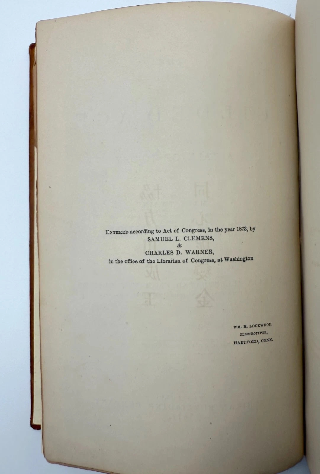 Open book with text on a white background