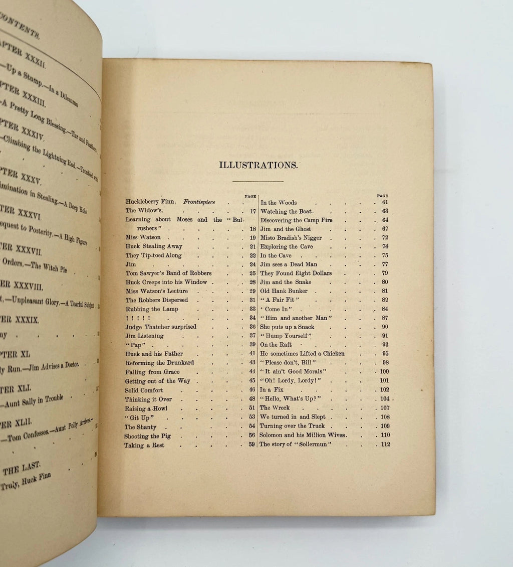 Open book showing table of contents and illustrations page on a white background