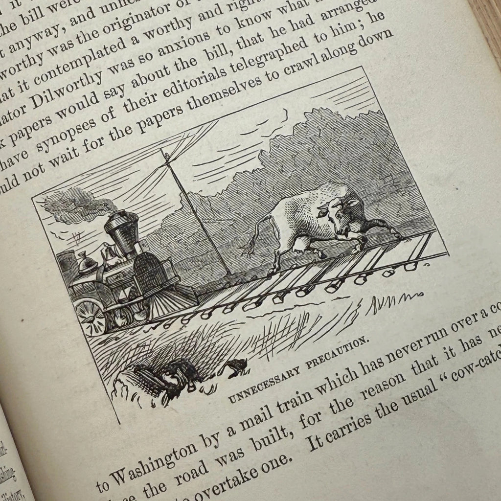 Vintage illustration of a bull on train tracks with a steam locomotive, surrounded by text.
