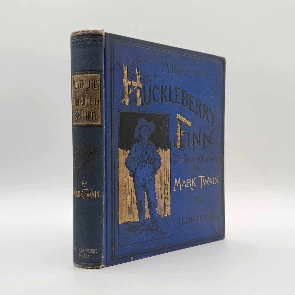 Adventures of Huckleberry Finn by Mark Twain 1885 first edition - original blue cloth binding with gilt vignette