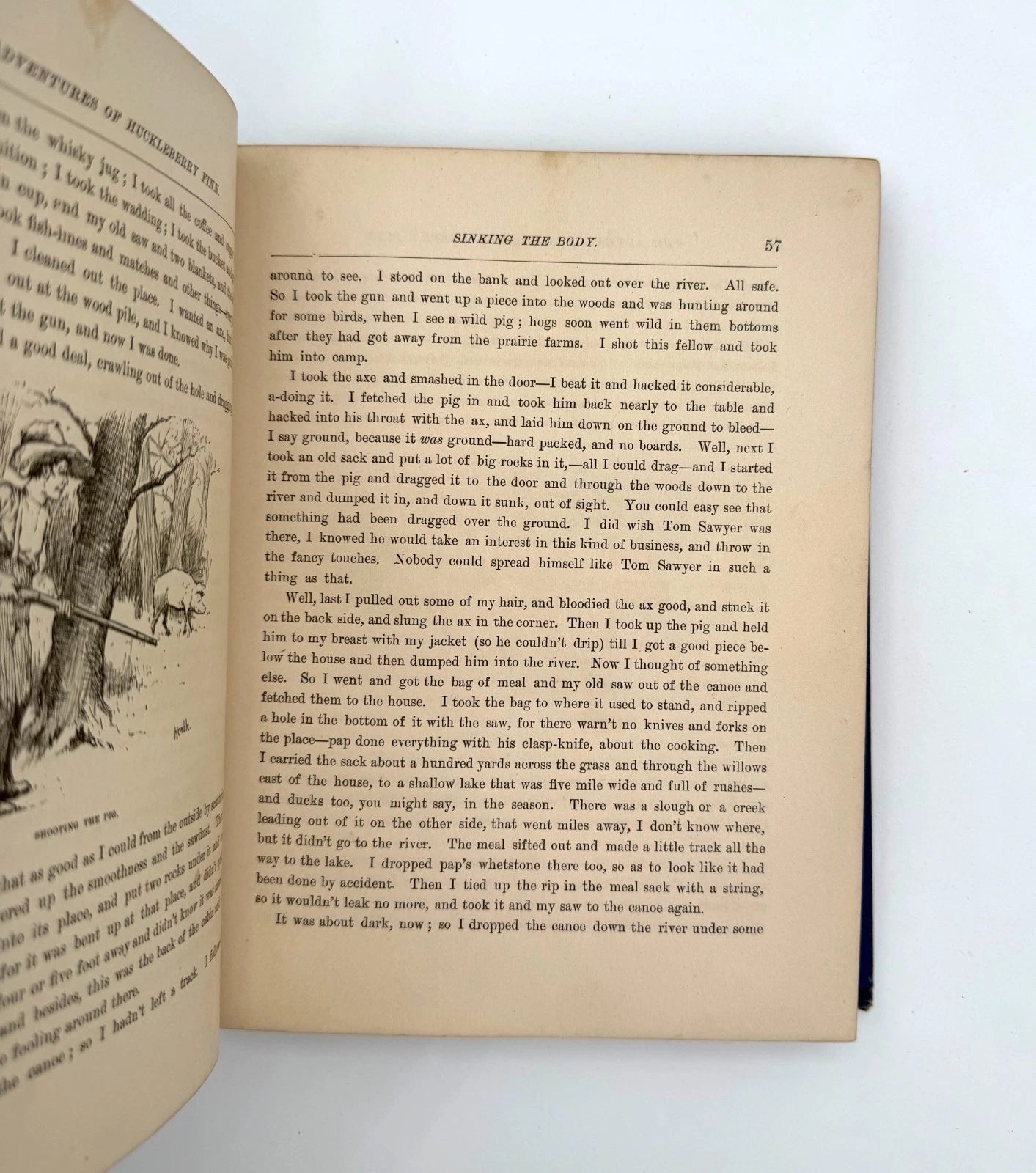 Open book with text and illustration on a white background